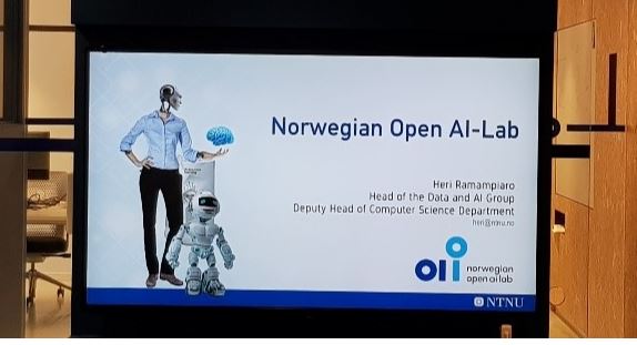 Colour photograph of presentation slide for Norwegian Open AI-Lab 