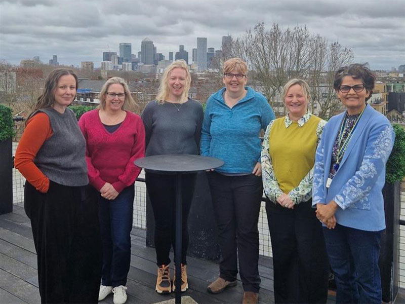 group of people on a roof top