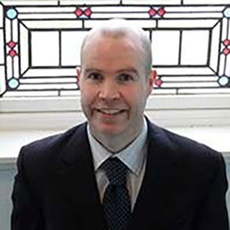 person smiling at the camera