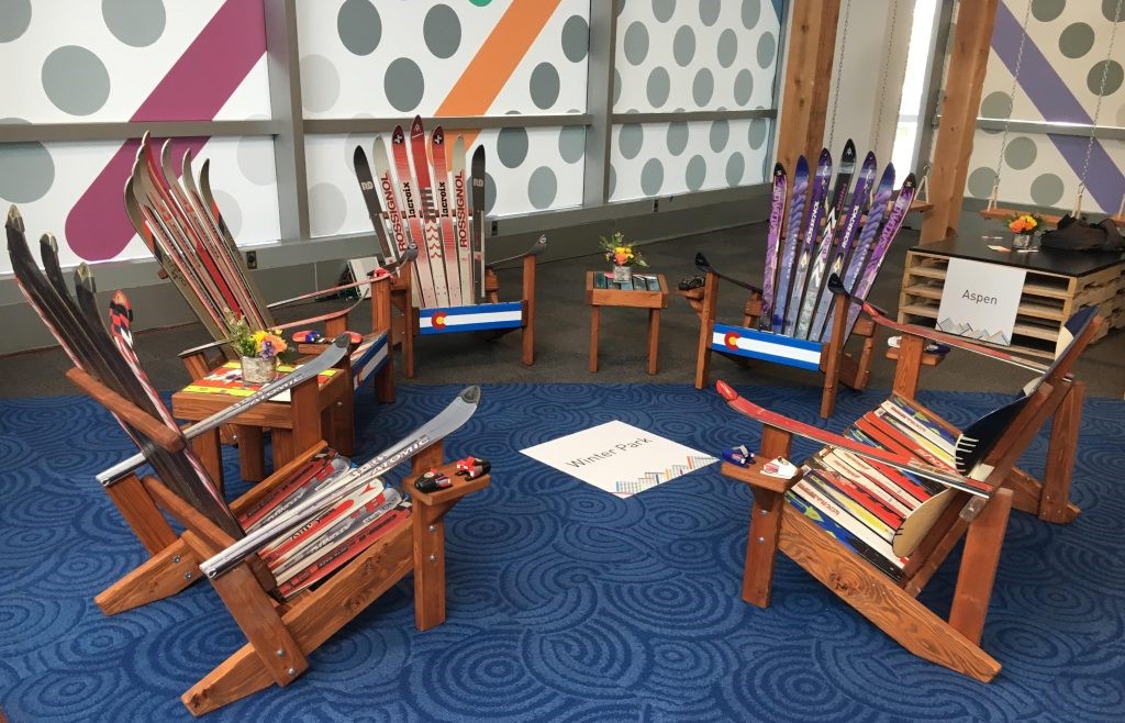 Photograph of chairs made of multi-colour skis at Educause 2019